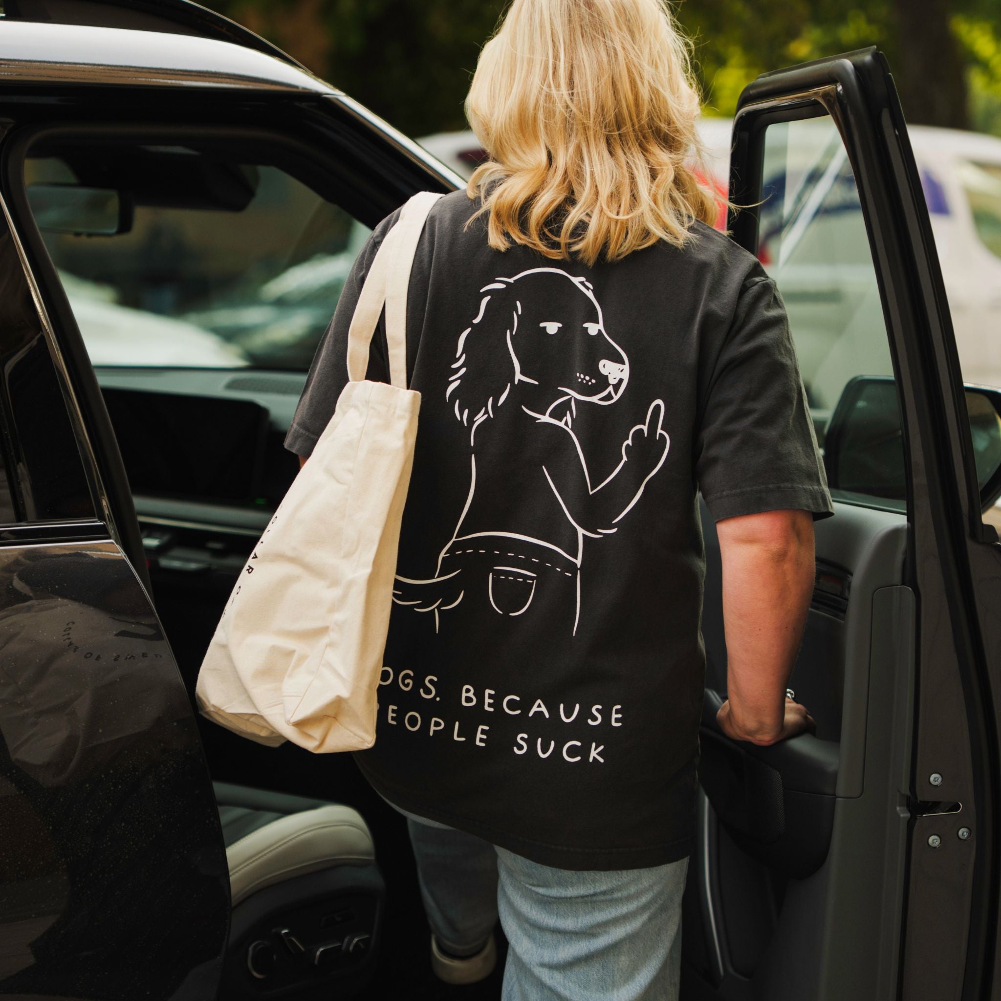 black-tshirt-dogs-because-people-suck-woman-wearing-s.jpg