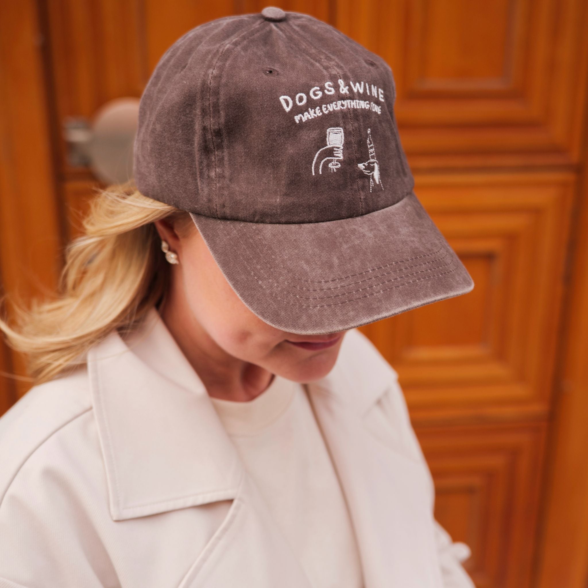 brown-denim-cap-dogs-wine-logo-blond-woman.jpg
