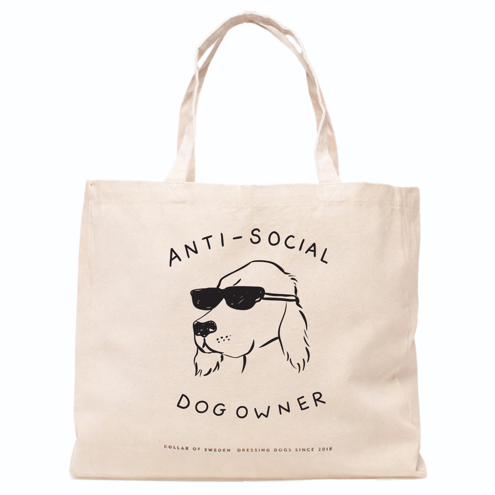 Beige tote bag with a dog illustration and the text Anti-Social Dog Owner on a white background